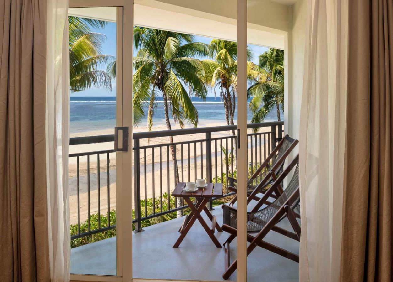 Outrigger Fiji Beach Resort Korotogo Екстер'єр фото A view of the beach from a room at the resort