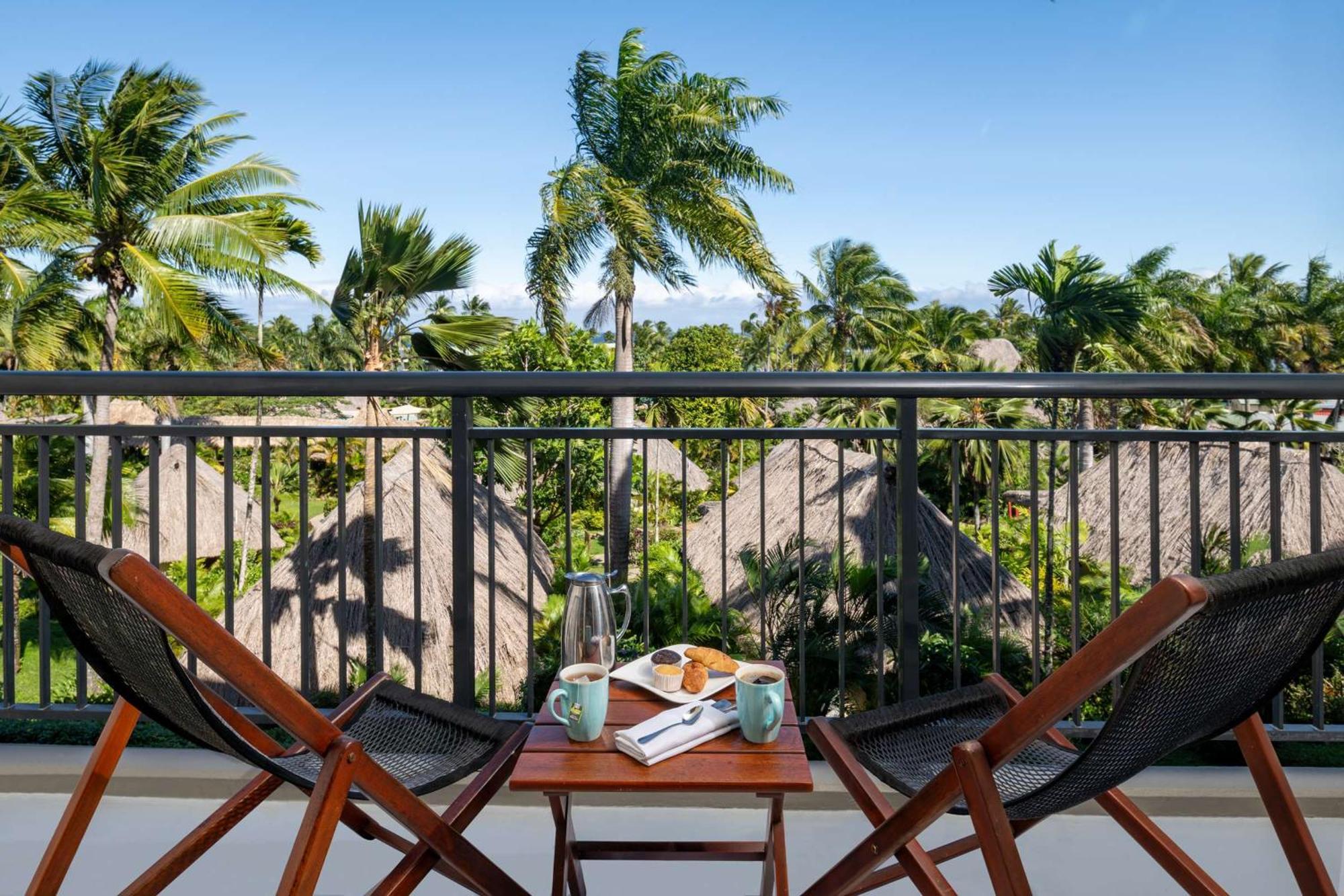 Outrigger Fiji Beach Resort Korotogo Екстер'єр фото A balcony at the resort